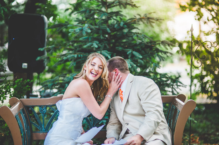 bride laughing during wedding vows