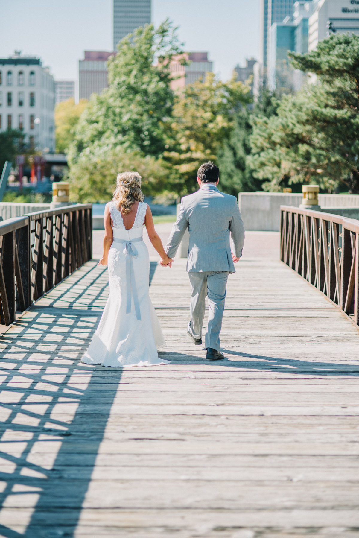 bride and groom walking before wedding